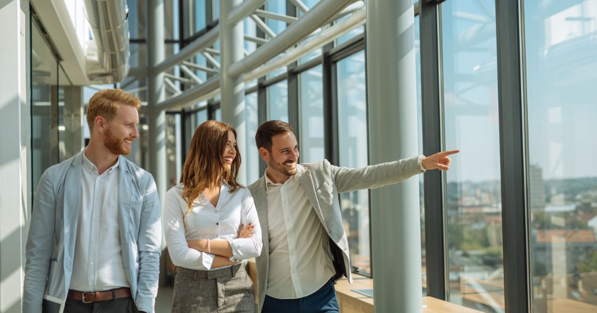 CRE executives touring a commercial building